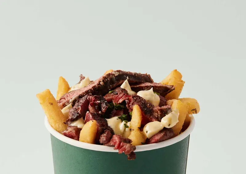 A Madeline's cup of steak frites